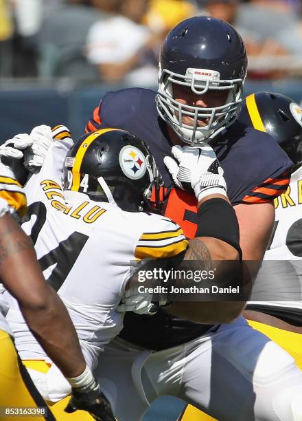 Kyle Long of the Chicago Bears blocks Tyson Alualu of the Pittsburgh Steelers at Soldier Field on September 24, 2017 in Chicago, Illinois. The Bears...