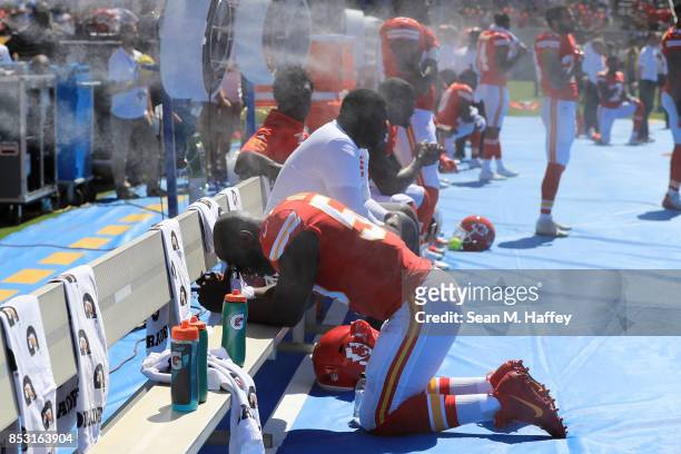 Justin Houston of the Kansas City Chiefs is seen taking a knee during the National Anthem before the game against the Los Angeles Chargers at the...