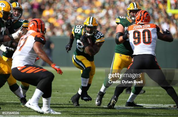 Ty Montgomery of the Green Bay Packers carries the ball during the first quarter against the Cincinnati Bengals at Lambeau Field on September 24,...