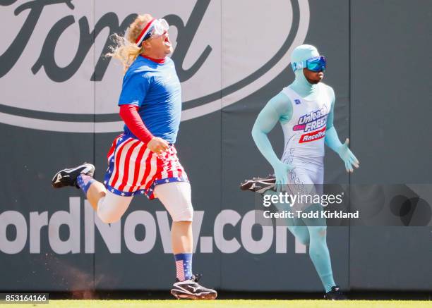 Fox Sports Southeast and former Atlanta Brave Paul Byrd races The Freeze in between innings of an MLB game between The Atlanta Braves and...