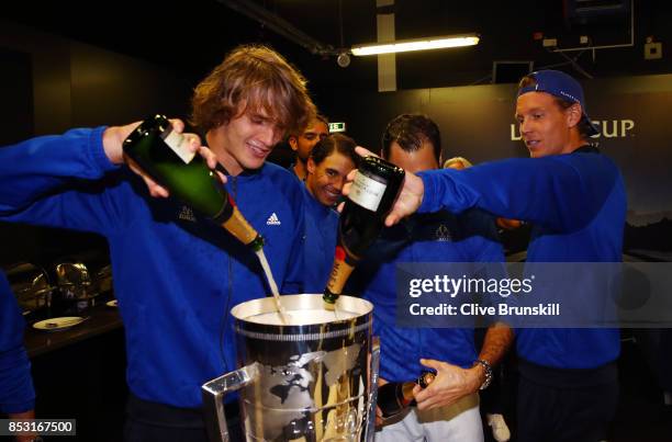 Alexander Zverev, Rafael Nadal, Roger Federer and Tomas Berdych of Team Europe drink champagne after winning the Laver Cup on the final day of the...