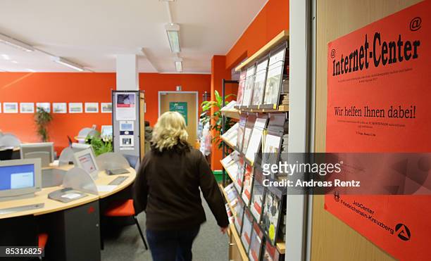 Woman enters the internet information center at a Federal Work Agency on March 9, 2009 in Berlin, Germany. A recent report by the European Commission...
