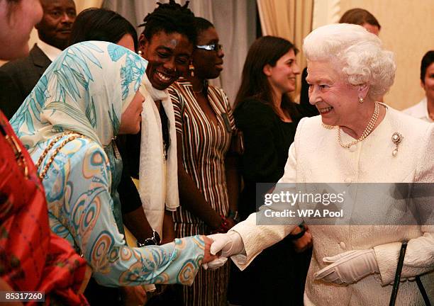Queen Elizabeth II meets guests during a Commonwealth Day Reception at Marlborough House on March 9, 2009 in London, England. The reception, which...