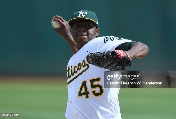 Jharel Cotton of the Oakland Athletics pitches against the Texas Rangers in the top of the first inning at Oakland Alameda Coliseum on September 24,...