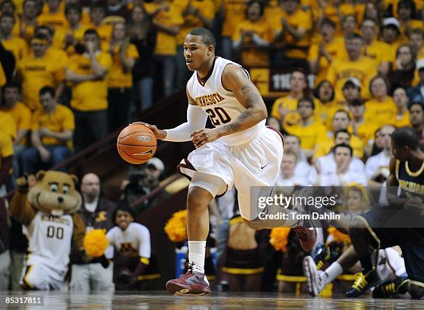 Lawence Westbrook of the Minnesota Golden Gophers brings the ball down court during an NCAA game against the University of Michigan Wolverines on...