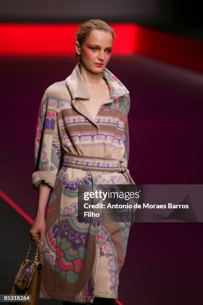 Model walks the runway at the Leonard Ready-to-Wear A/W 2009 fashion show during Paris Fashion Week at Le Carrousel du Louvre on March 9, 2009 in...