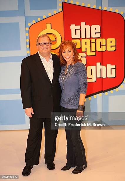 Host Drew Carey and actress/recording artist Reba McEntire speak during a segment of "The Price is Right" at CBS Television City on March 9, 2009 in...
