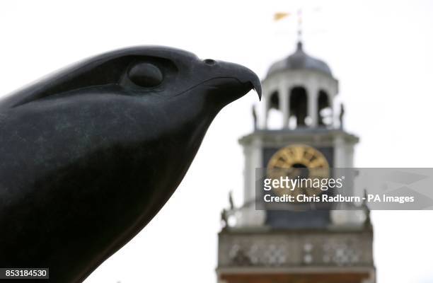 Bronze sculpture of a Peregrine Falcon weighing 1.5 tonnes and standing 3 metres tall is lifted into place at Hatfield house in Hertfordshire, as the...