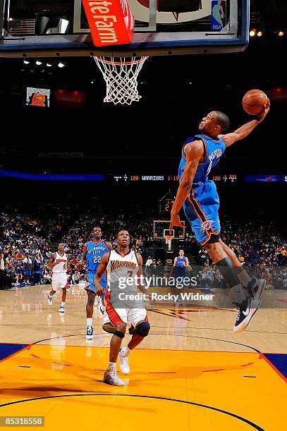 Russell Westbrook of the Oklahoma City Thunder goes to the basket for a slam dunk during the game against the Golden State Warriors on February 21,...