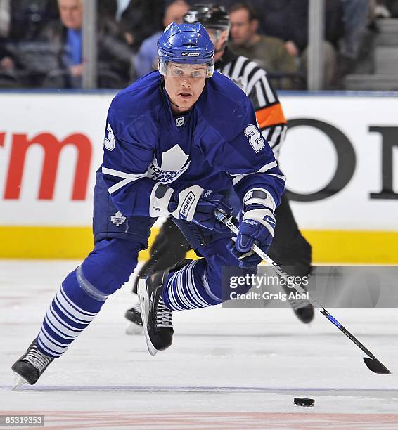 Alexei Ponikarovsky of the Toronto Maple Leafs skates with the puck during game action against the New Jersey Devils March 3, 2009 at the Air Canada...