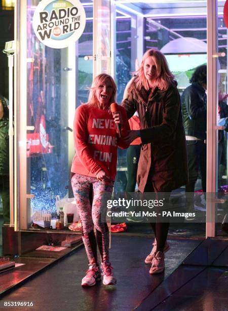 Radio 2 presenter Jo Whiley celebrates after completing her Sport Relief challenge - to run on a treadmill inside a perspex box for 26 hours whilst...