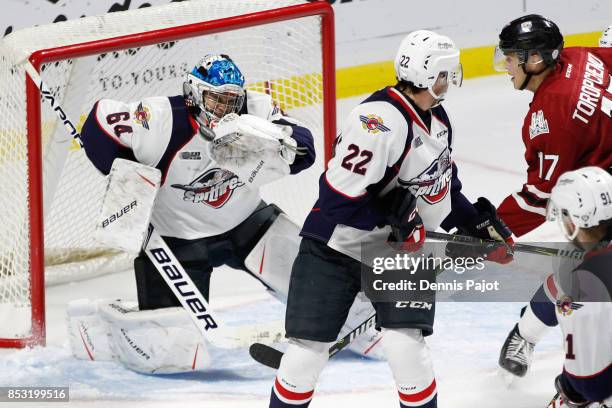 Goaltender Michael DiPietro of the Windsor Spitfires makes a save on a shot from the Guelph Storm on September 24, 2017 at the WFCU Centre in...