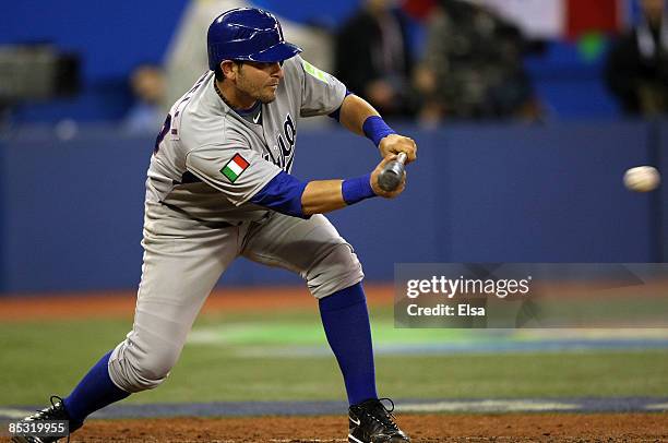 Francisco Cervelli of Italy hits a sacrifice bunt during the 2009 World Baseball Classic Pool C game on March 9, 2009 at the Rogers Centre in...