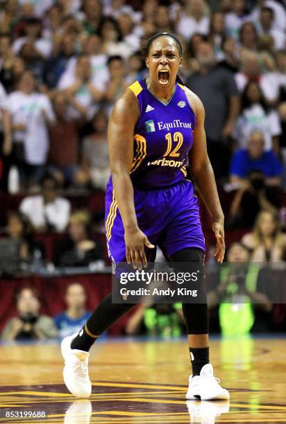 Chelsea Gray of the Los Angeles Sparks celebrates after making the game winning basket over the Minnesota Lynx during the fourth quarter of Game One...