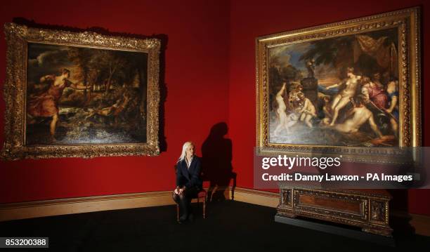 Scottish National Gallery employee Claire Pentony is sitting in front of two paintings by Titian, The Death of Actaeon and Diana and Callisto, which...