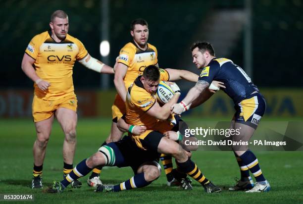 Wasps Tom Lindsay is tackled by Worcester's Euan Murray and Ryan Lamb during the Aviva Premiership match at Sixways Stadium, Worcester.