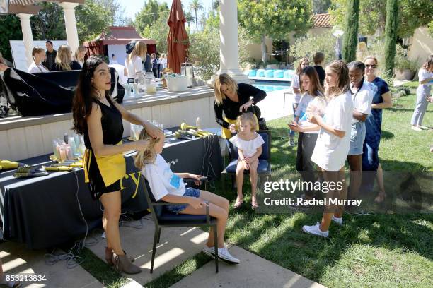 Guests visit the Drybar station during the Positively Social launch event on September 24, 2017 in Beverly Hills, California.
