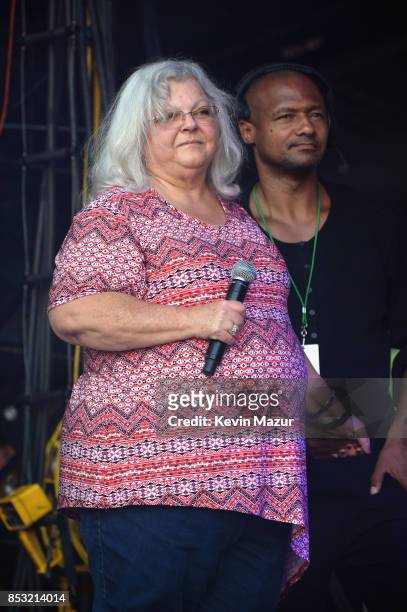 Susan Bro, mother of Heather Heyer, watches as Dave Matthews speaks onstage at "A Concert for Charlottesville," at University of Virginia's Scott...