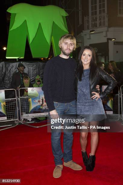 James Buckley and partner Clair Meek arriving at the celebrity screening of Muppets Most Wanted at the Curzon Mayfair in central London.