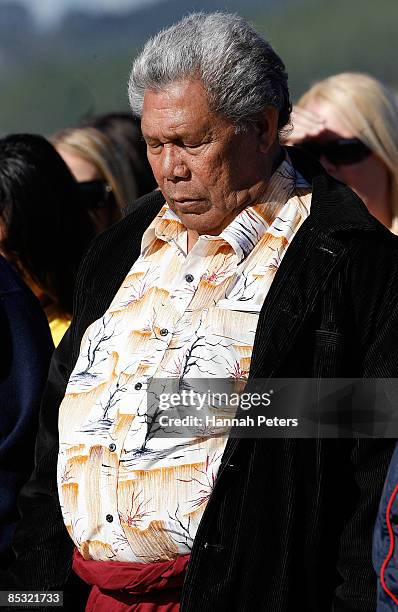 Friend mourns during a memorial service for missing Warriors NRL player Sonny Fai at Bethells Beach on March 10, 2009 in Auckland, New Zealand. Fai...