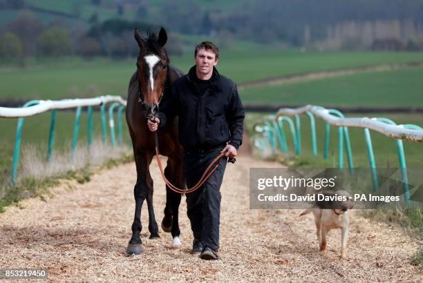Trainer Michael Scudamore with Monbeg Dude during the stable visit at Eccleswall Court, Ross-on-Wye.
