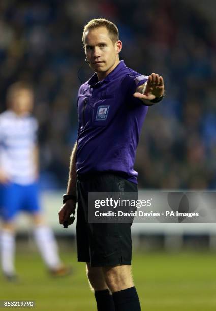 Referee S.Martin during the Sky Bet Championship match at the Madejski Stadium, Reading.