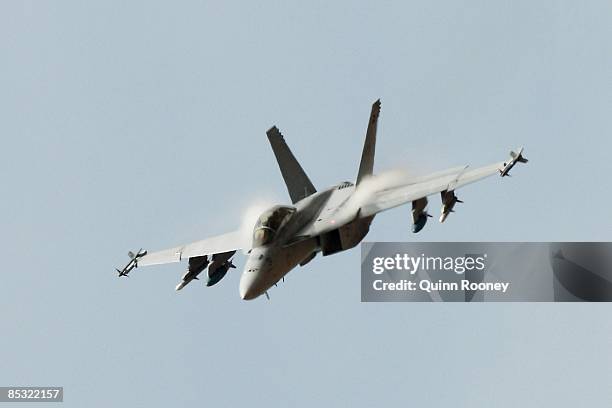 An F/A 18F Super Hornet is seen during the first day of flying practice at "Avalon 2009", The 2009 Australian International Airshow and Aerospace and...