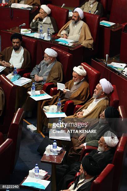 Iran's top clerics and members of the Assembly of Experts listen to a speech by Former Iranian president Akbar Hashemi Rafsanjani during the...