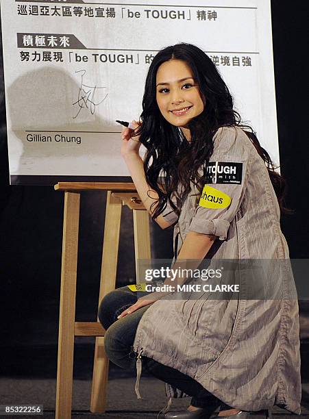 Canto-pop star Gillian Chung appears at a promotional event in Hong Kong on March 10, 2009. Chung was involved in a high profile scandal in 2008...