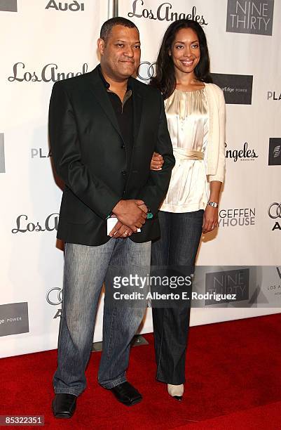 Actor Laurence Fishburne and actress Gina Torres arrive at the 7th Annual Backstage at the Geffen Gala on March 9, 2009 in Los Angeles, California.