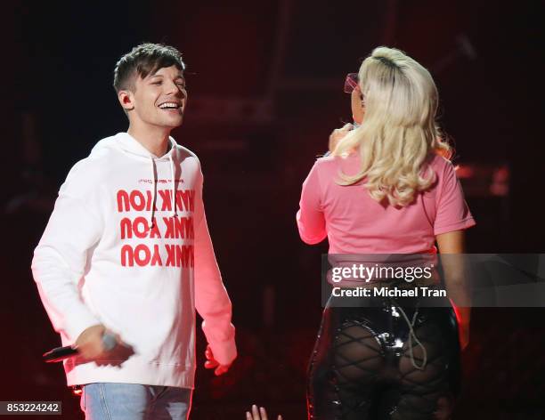 Bebe Rexha and Louis Tomlinson perform onstage during the 2017 iHeartRadio Music Festival - Night 2 held at T-Mobile Arena on September 23, 2017 in...