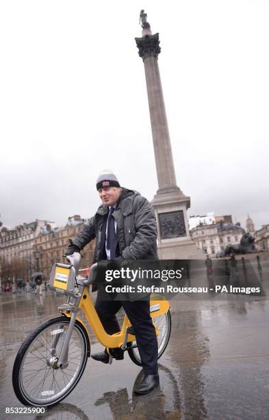 Previously unreleased photo dated 26/03/14 of the Mayor of London Boris Johnson riding a 'Boris Bike' painted yellow 100 days before the Tour de...