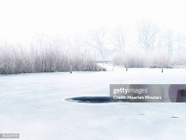 plain ice hole - hole stock pictures, royalty-free photos & images