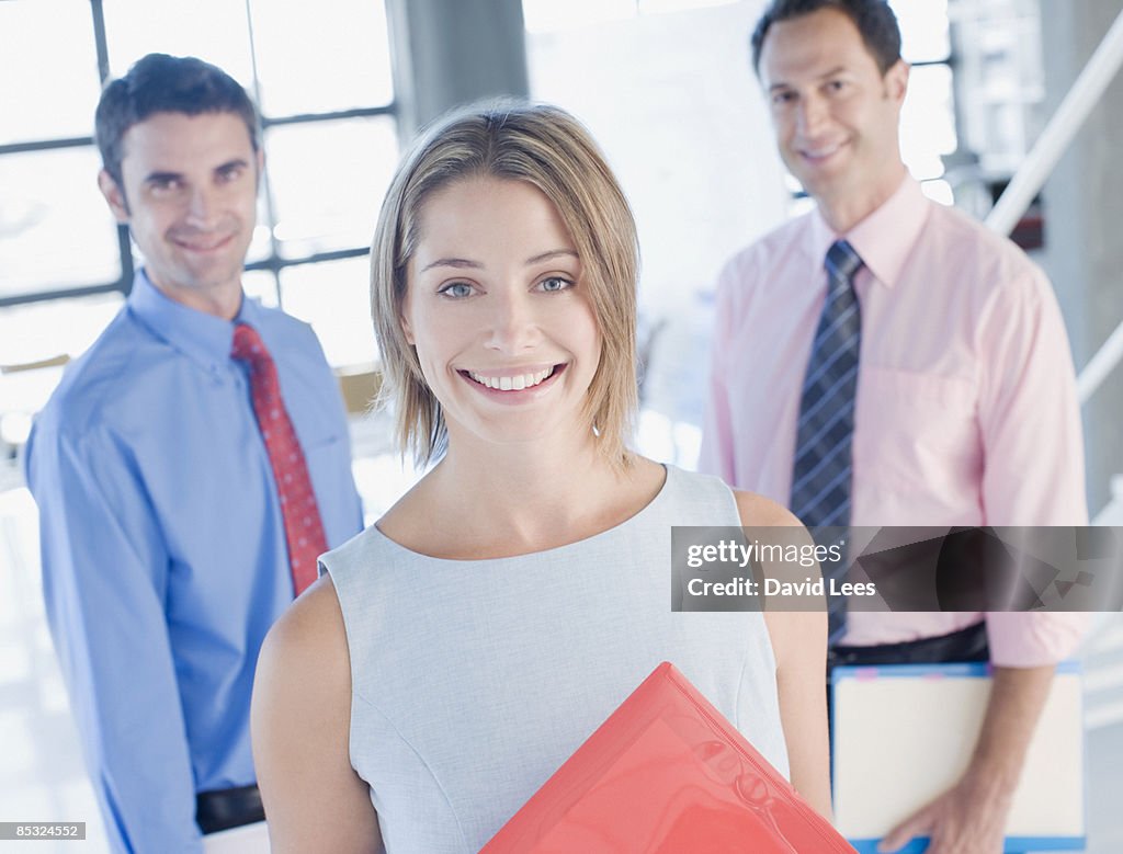 Group of business people, smiling