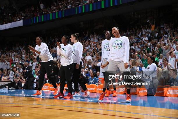 Plenette Pierson and Natasha Howard of the Minnesota Lynx with teammates react to a play against the Los Angeles Sparks in Game One of the 2017 WNBA...