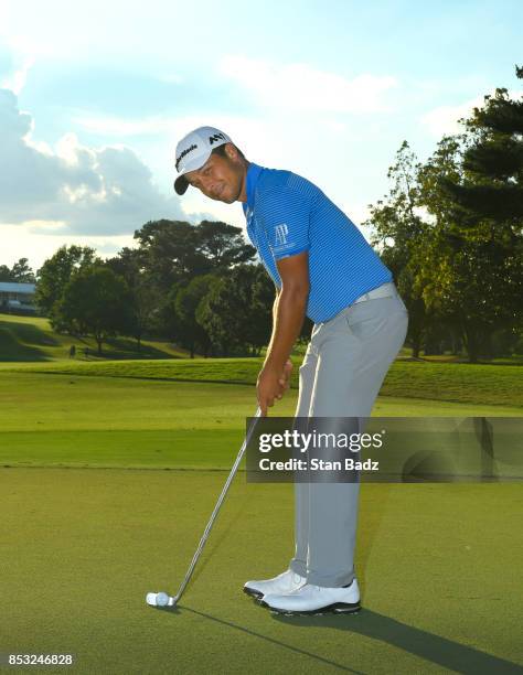 Xander Schauffele of the United States celebrates with the Calamity Jane trophy on the 18th green after winning the final round of the TOUR...