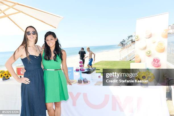 Angela Sunderland and Evelyn Rusli attend Maisonette Beach BBQ on September 24, 2017 in Malibu, California.