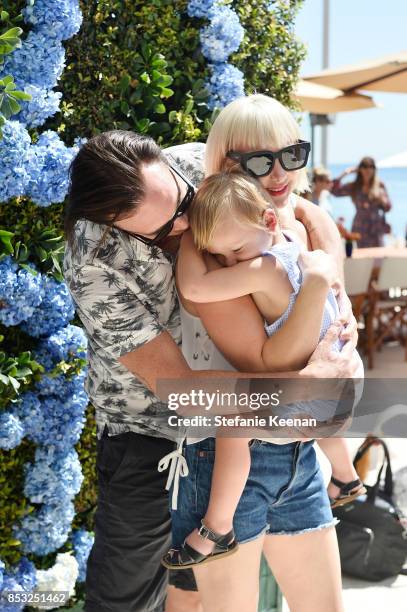 Donovan Leitch, Libby Mintz and son attend Maisonette Beach BBQ on September 24, 2017 in Malibu, California.