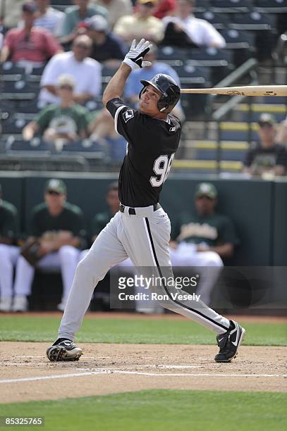 Jordan Danks of the Chicago White Sox bats during the game against the Oakland Athletics on March 4, 2009 at Phoenix Municipal Stadium in Phoenix,...