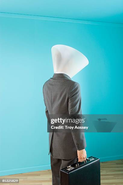 businessman wearing plastic funnel as a head - protective collar stock pictures, royalty-free photos & images