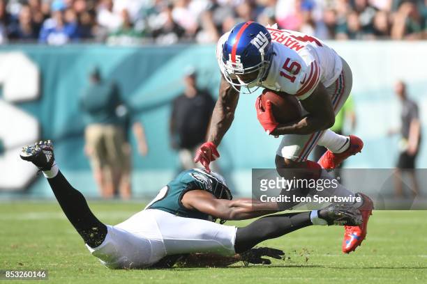 New York Giants wide receiver Brandon Marshall is upended by Philadelphia Eagles cornerback Jalen Mills during a NFL football game between the New...