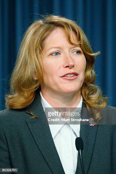 Kathy WInters, Shuttle weather officer, addresses the media during the Space Shuttle Discovery L-1 pre-launch briefing March 10, 2009 in Cape...