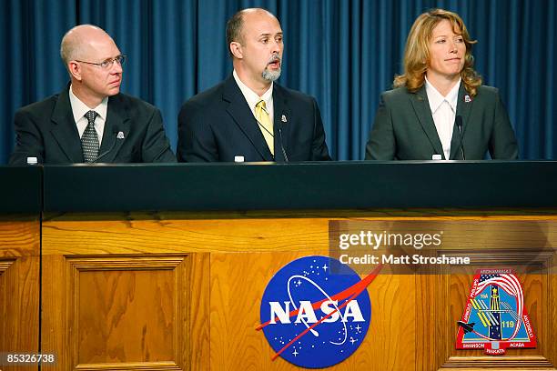 Steve Payne, NASA test director, Robby Ashley, STS-119 Payload Manager, and Kathy WInters, Shuttle weather officer, address the media during the...