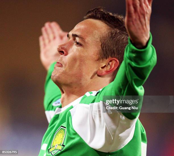 Ryan Alan Griffiths of Beijing Guoan racts after he scored during the AFC Champions League Group E match between Beijing Guoan and the Newcastle Jets...