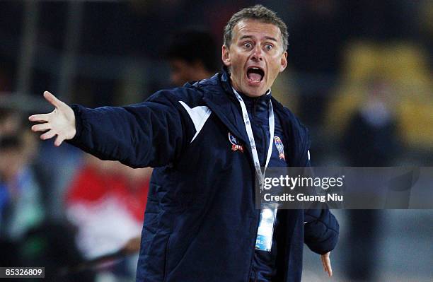 Newcastle Jets coach Gary Van Egmond gestures during the AFC Champions League Group E match between Beijing Guoan and the Newcastle Jets at Beijing...