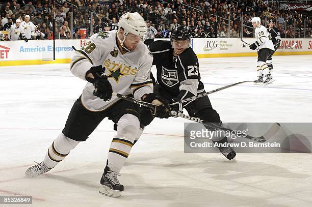 Mark Fistric of the Dallas Stars fights for position against Dustin Brown of the Los Angeles Kings during the game on March 5, 2009 at Staples Center...