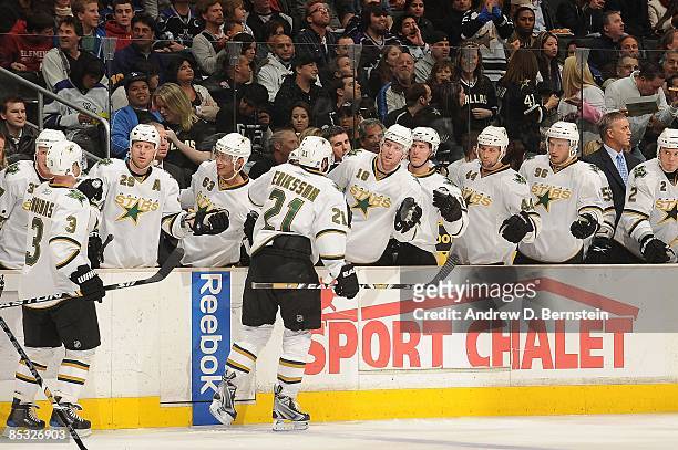 Loui Eriksson of the Dallas Stars celebrates with his teammates his goal assist to teammate Steve Ott against the Los Angeles Kings during the game...