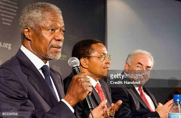 In this handout image provided by the IMF , Former UN General Secretary and President of the Global Humanitarian Forum Kofi Annan speaks beside...