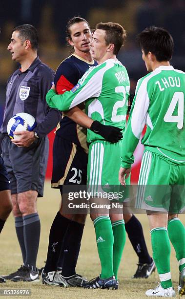 Alan Griffiths Ryan of Beijing Guoan greets Adam David Griffiths of Newcastle Jets after the match in the AFC Champions League Group E match between...