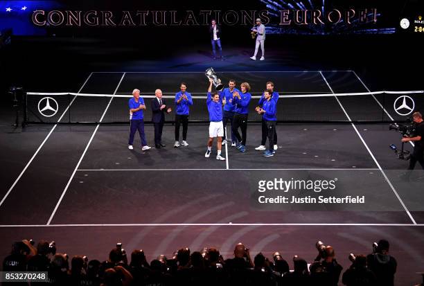 Roger Federer poses with trophy with team mates Marin Cilic, Bjorn Borg, Rafael Nadal, Rod Laver, Alexander Zverev, Tomas Berdych and Dominic Thiem...